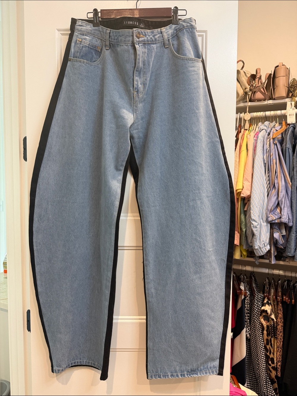 Lioness horseshoe barrel leg jeans in black and blue contrast